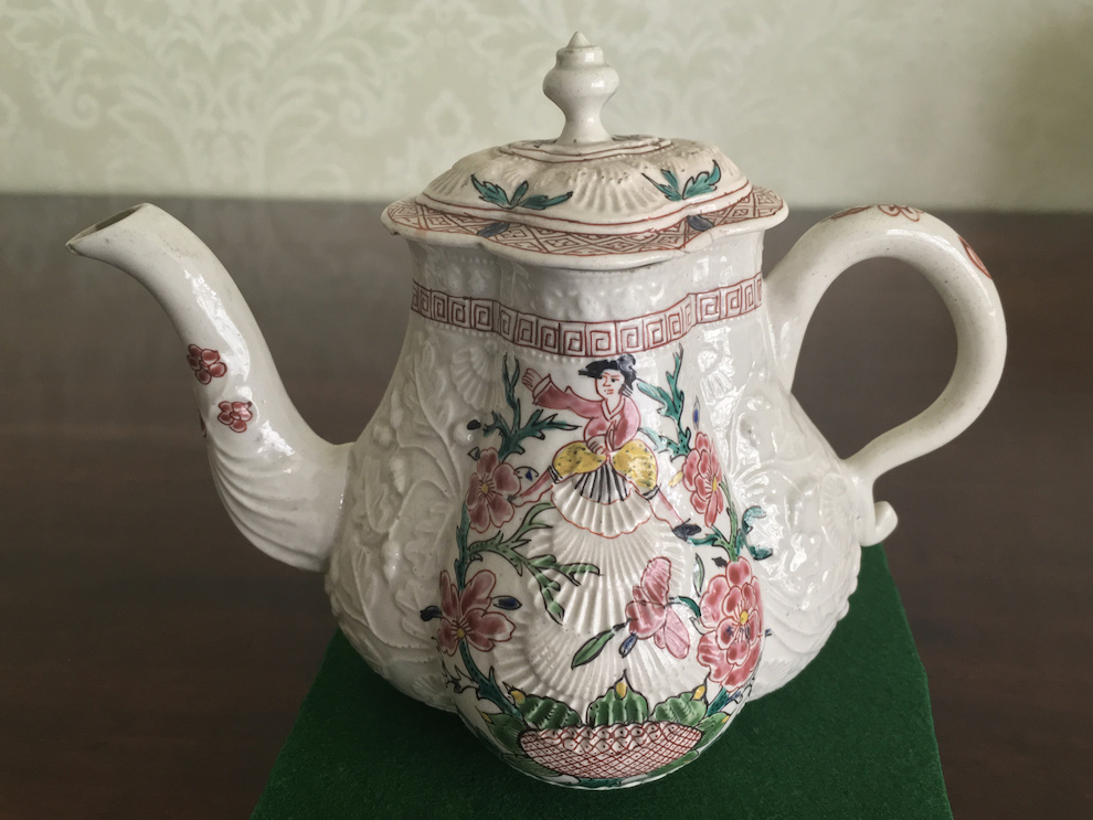 Coloured Staffordshire saltglaze pectan shell teapot. Circa 1755.